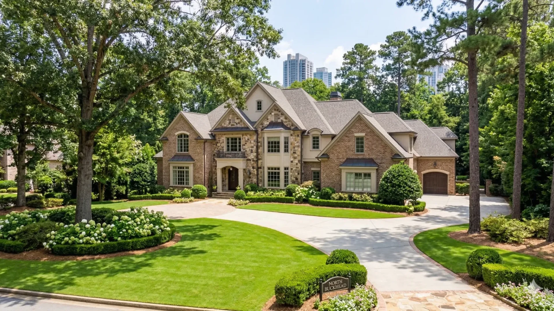 Brick and stone estate with a wide lawn and the skyline beyond the treetops
